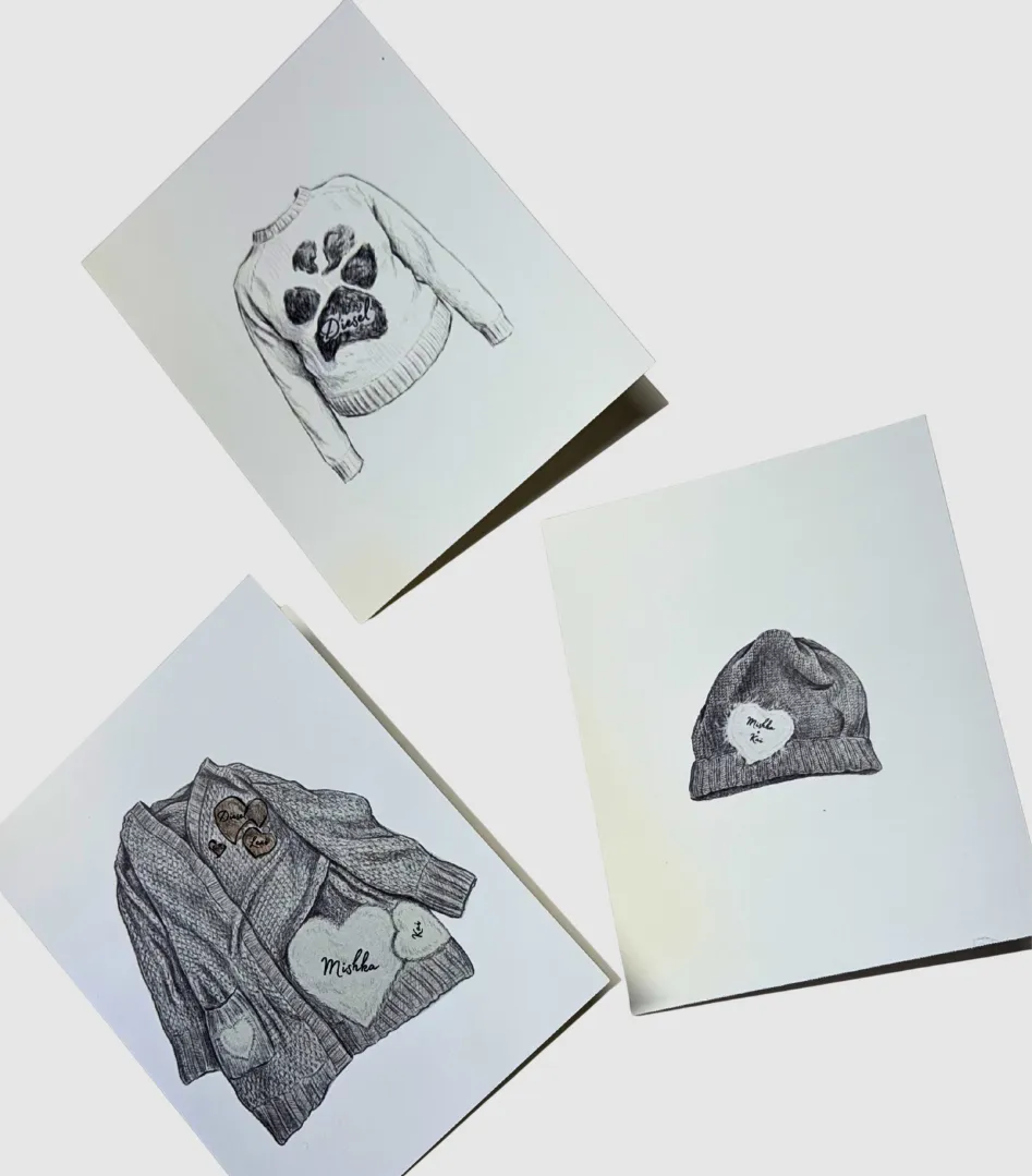 Three hand-drawn fashion sketches illustrating custom knitwear designs, including a paw print sweater, a beanie, and a cardigan.